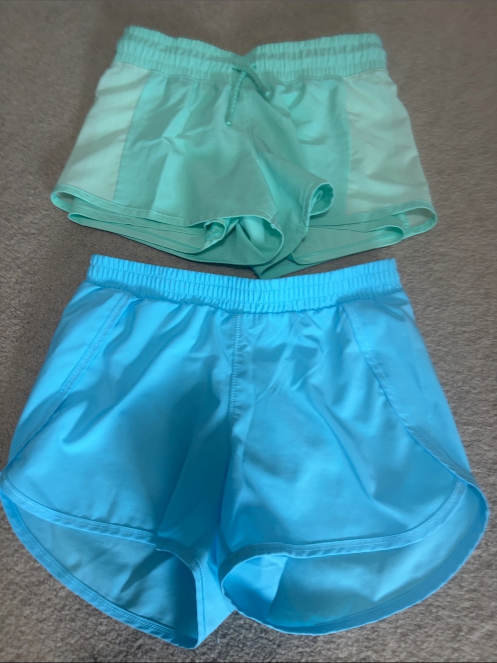 Pair of Girls Athletic Shorts in Mint and Aqua size large/10/12